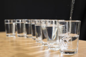 water being poured into glass 