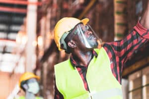 construction worker wearing face shield 